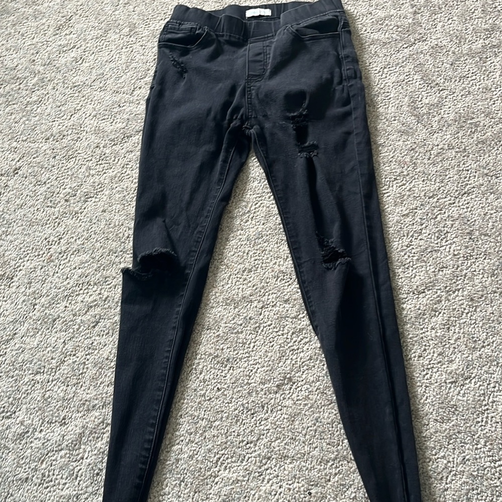 Stretchy waste ripped skinny jeans